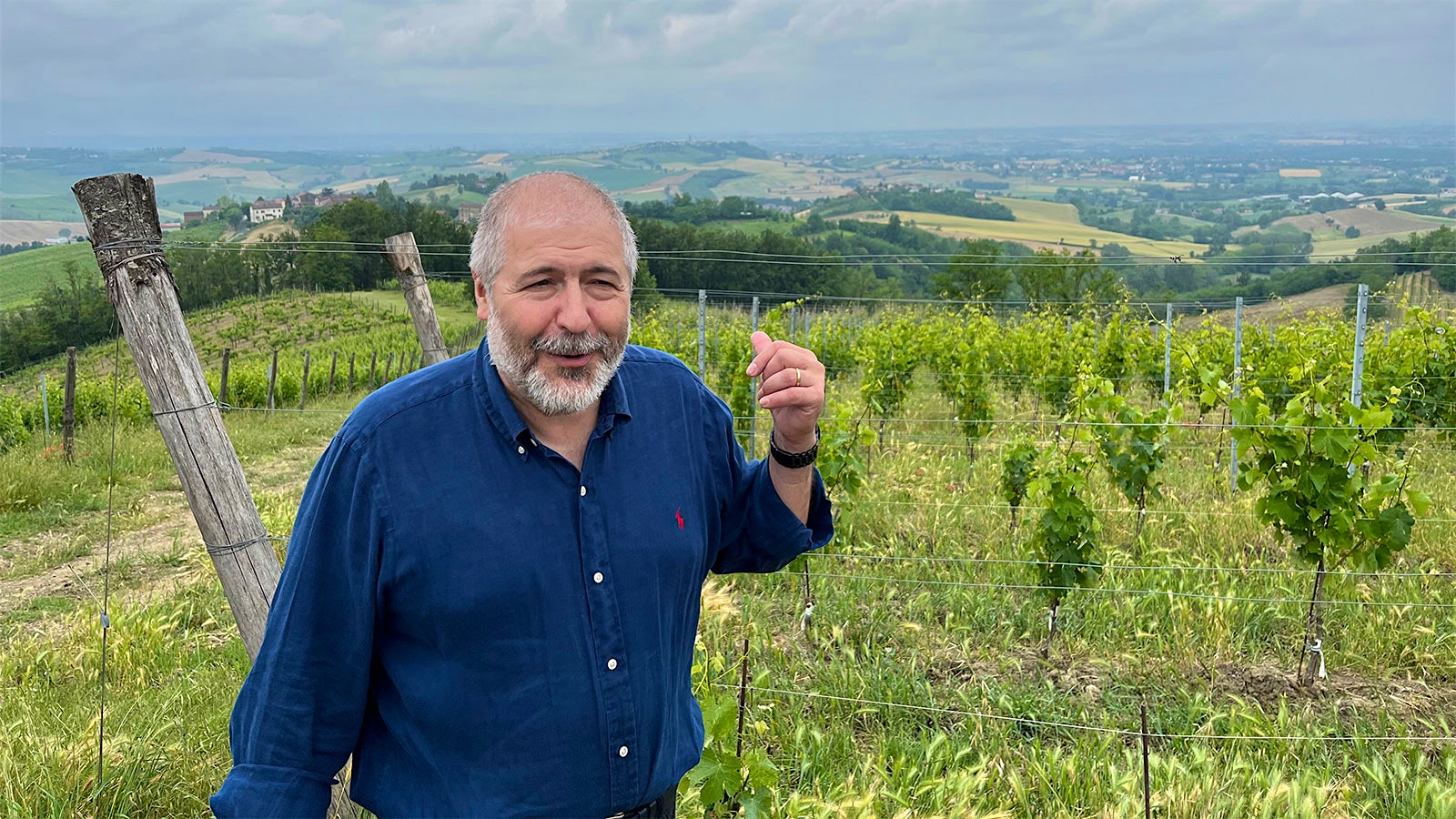 Portrait of Paolo Repetto, of Vigneti Repetto and president of the Colli Tortonesi wine consortium, standing in a Timorasso vineyard in the Derthona appellation